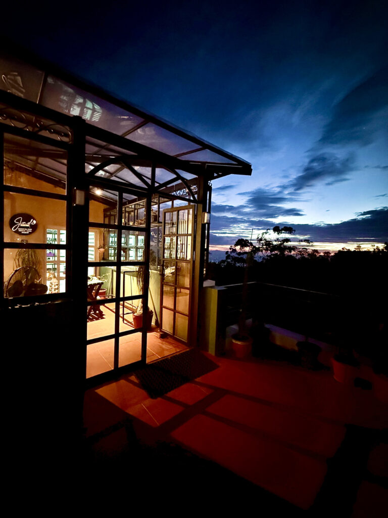 Jade Artefacts and Bistro Yercaud during sunset with scenic hill views